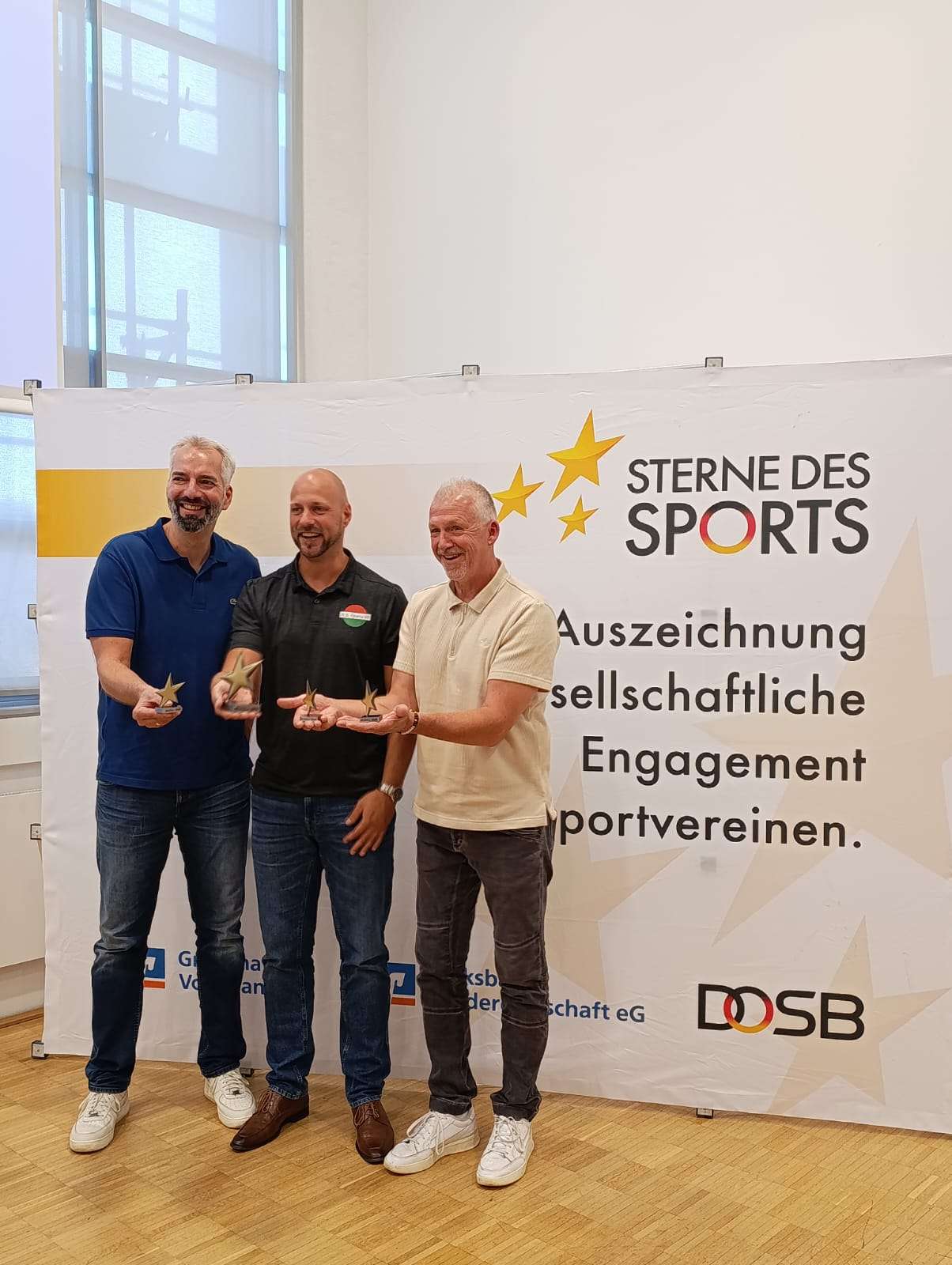 Preisträger mit Bronzesternen bei der Preisverleihung